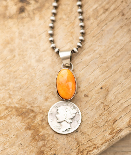 Oval Orange Spiny Mercury Dime Pendant